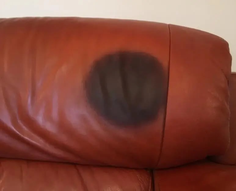 body oil damage on leather furniture