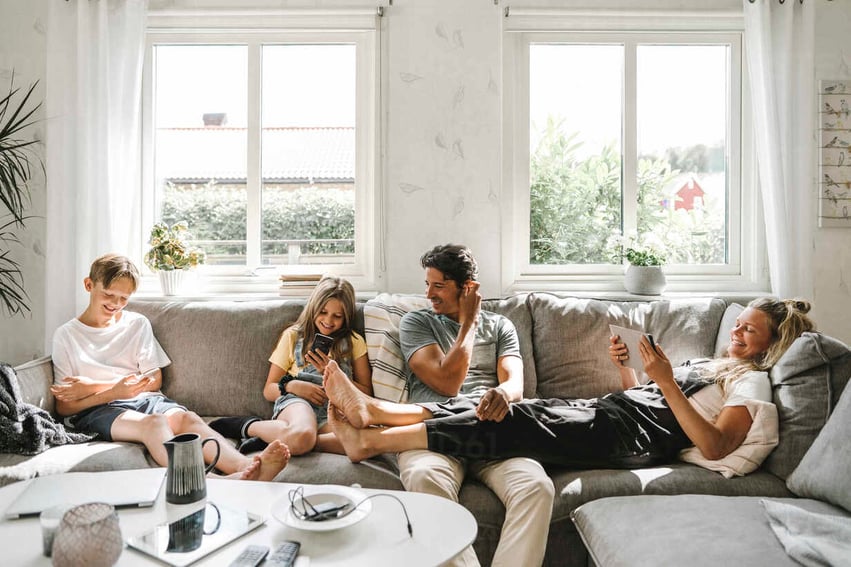 family enjoying comfy living room furniture