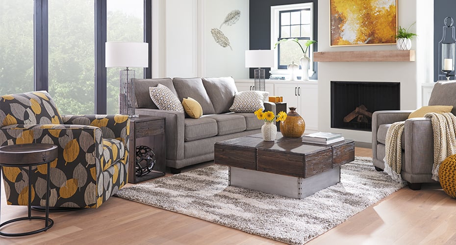 grey leather kennedy sofa with chair in living room