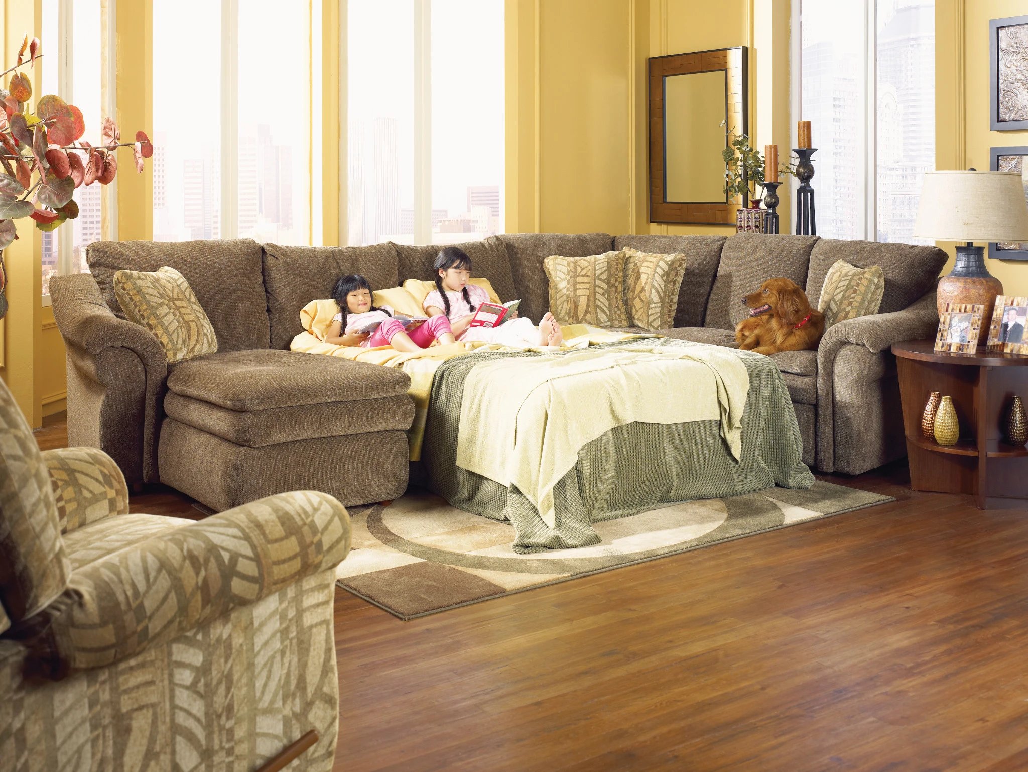 kids enjoying sleeper sofa in living room