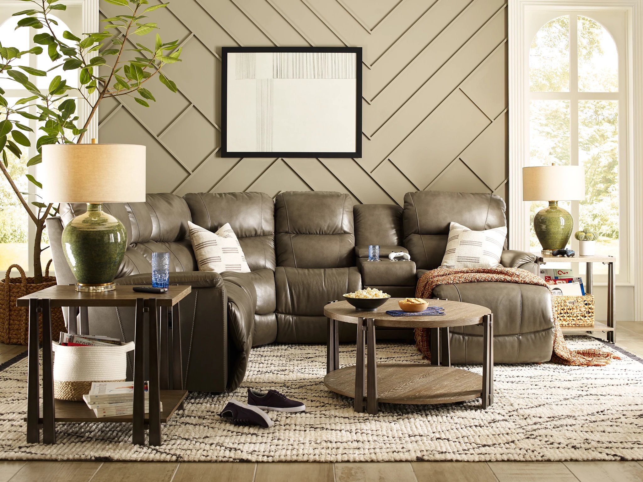 living room with a leather reclining sectional