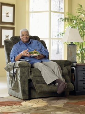 man enjoying la-z-boy heat and massage recliner