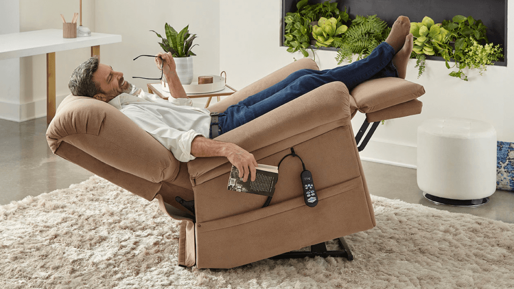 man enjoying laying back in recliner chair