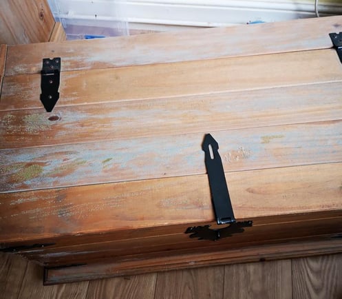 mold growing on wooden chest