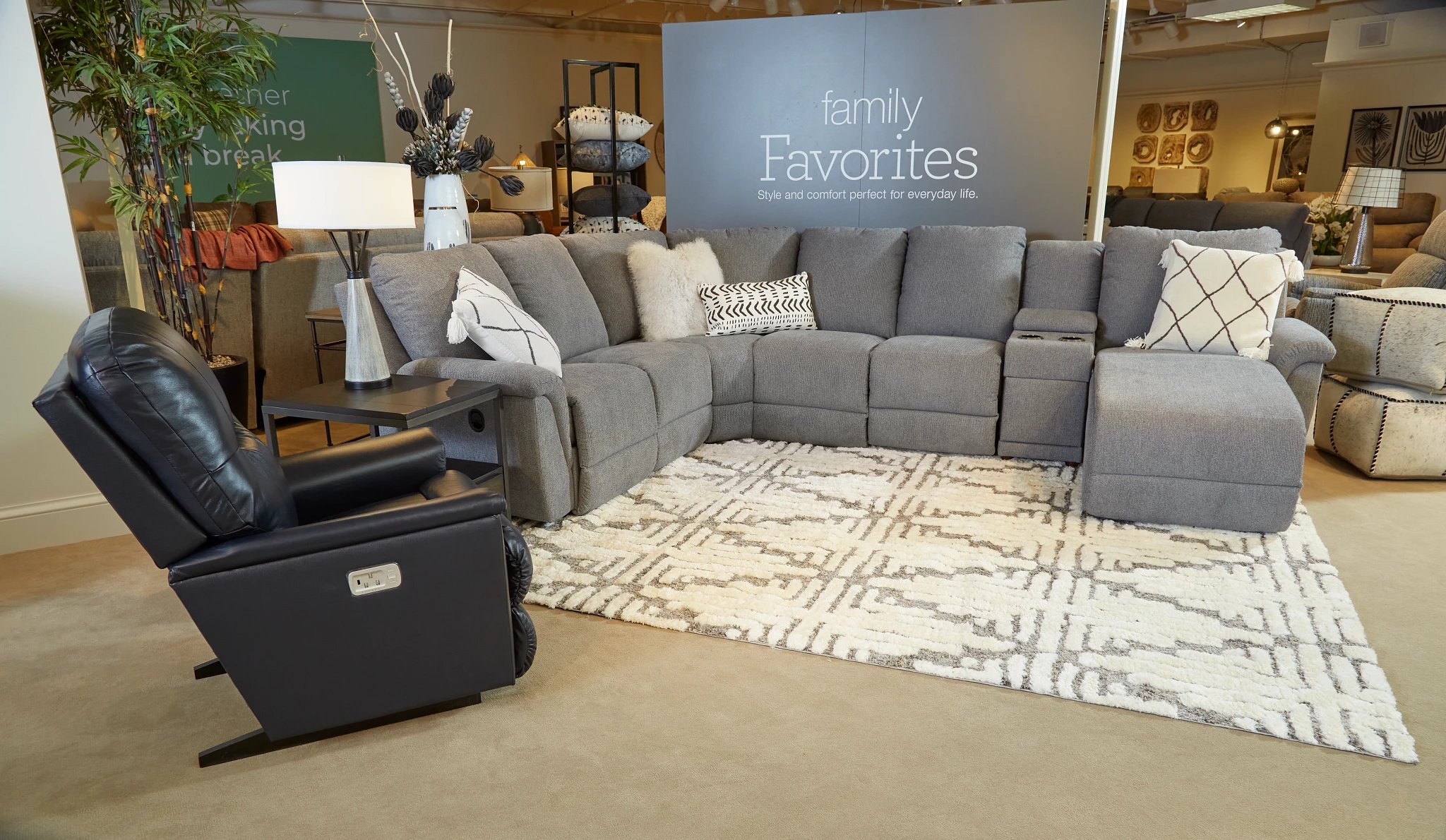 rocker recliner and sofas in furniture showroom