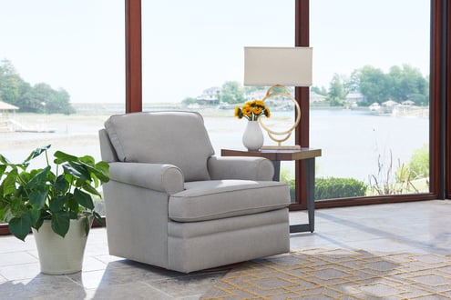 roxie swivel chair in decorated living room by window