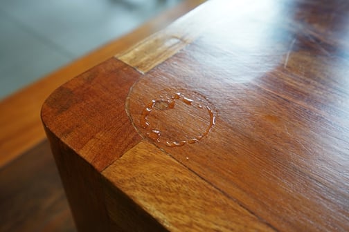 watermark on wooden end table