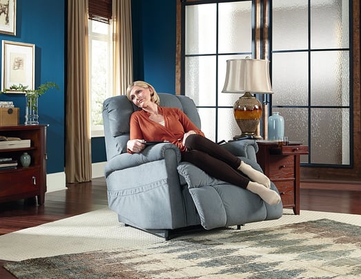 woman enjoying la-z-boy power lift recliner