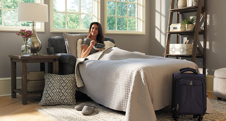 woman laying up in extended sofa bed