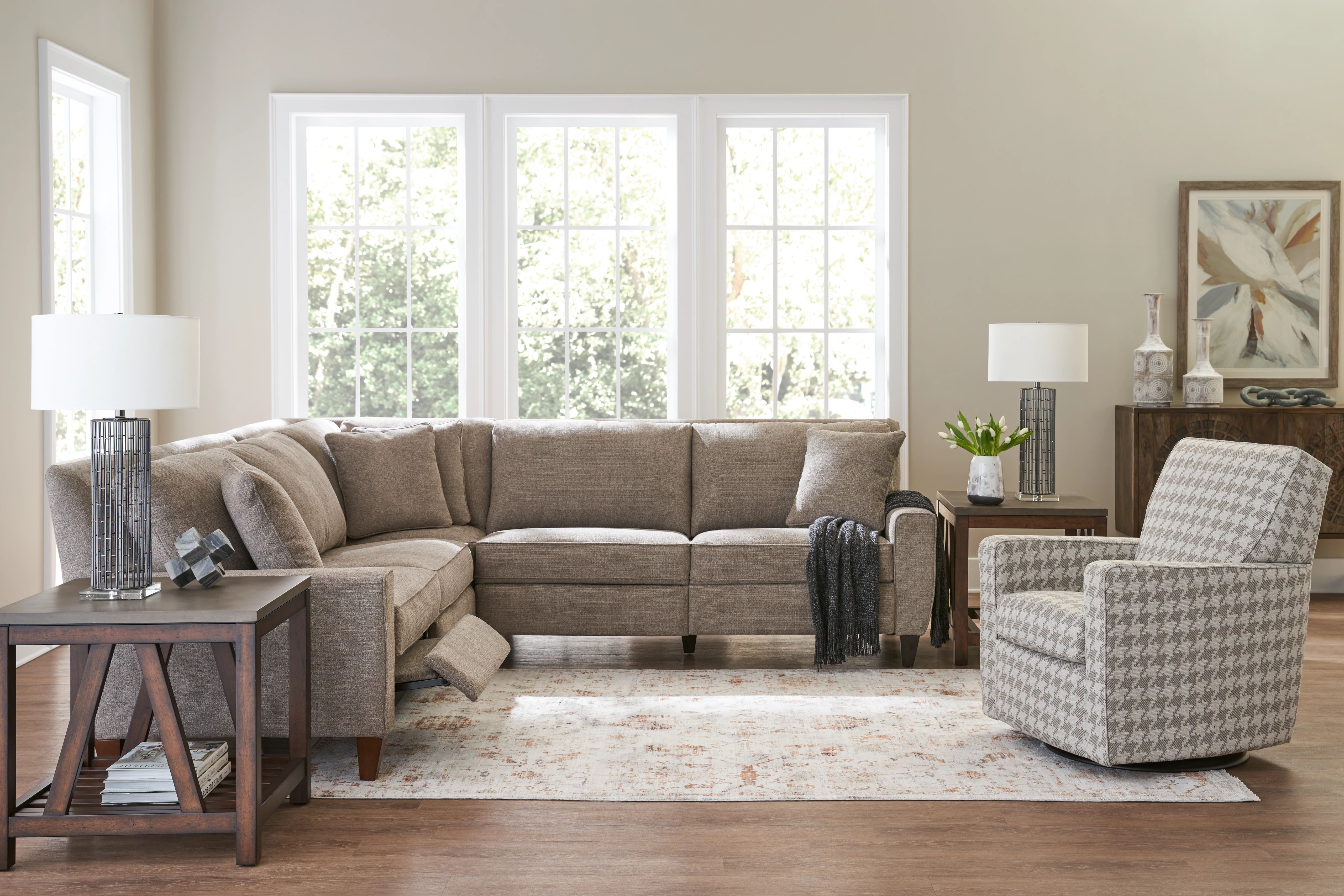 decorated living room with la-z-boy gliding recliner