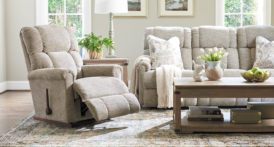 white fabric recliner chair in decorated living room