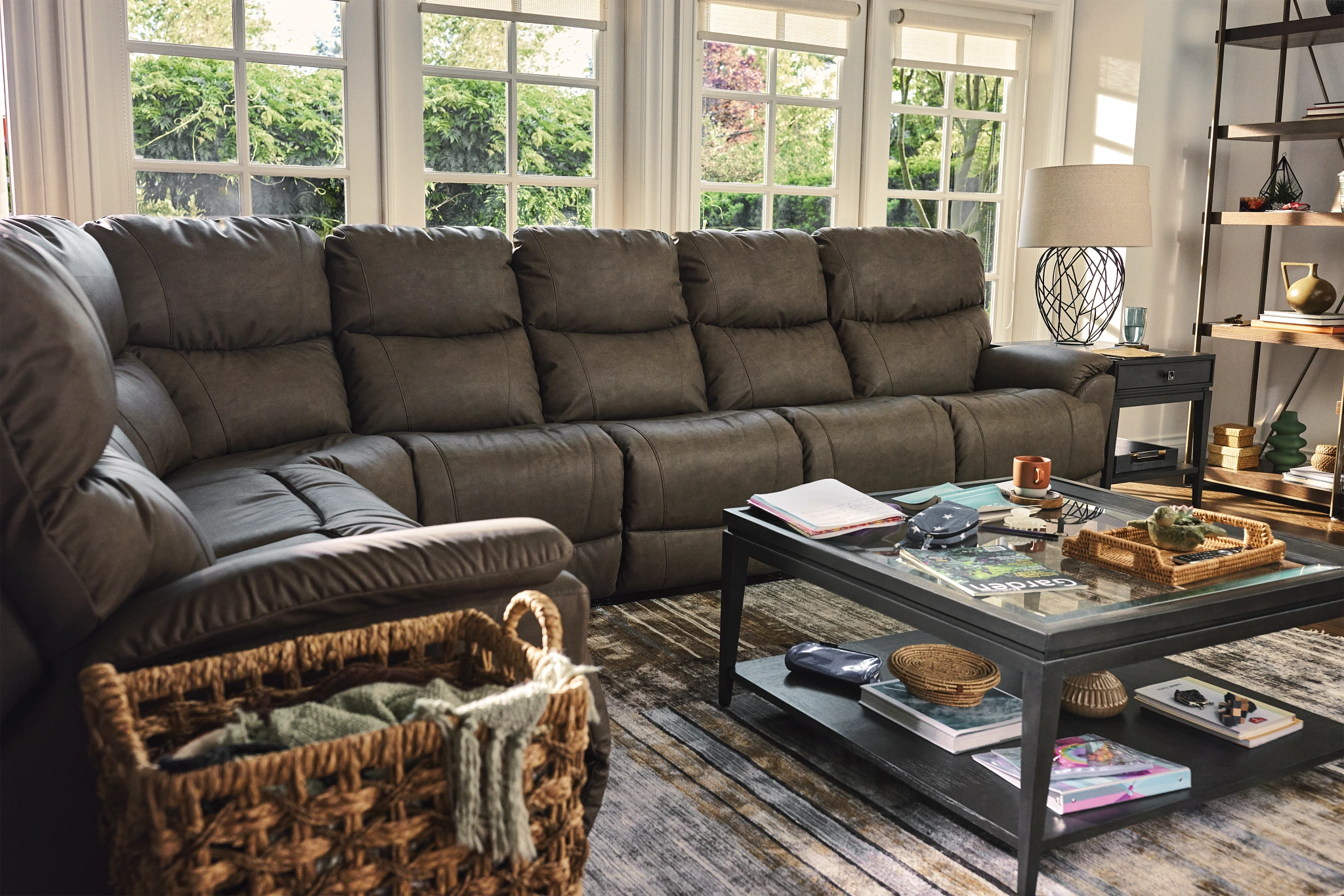 well designed living room with brown reclining sectional sofa