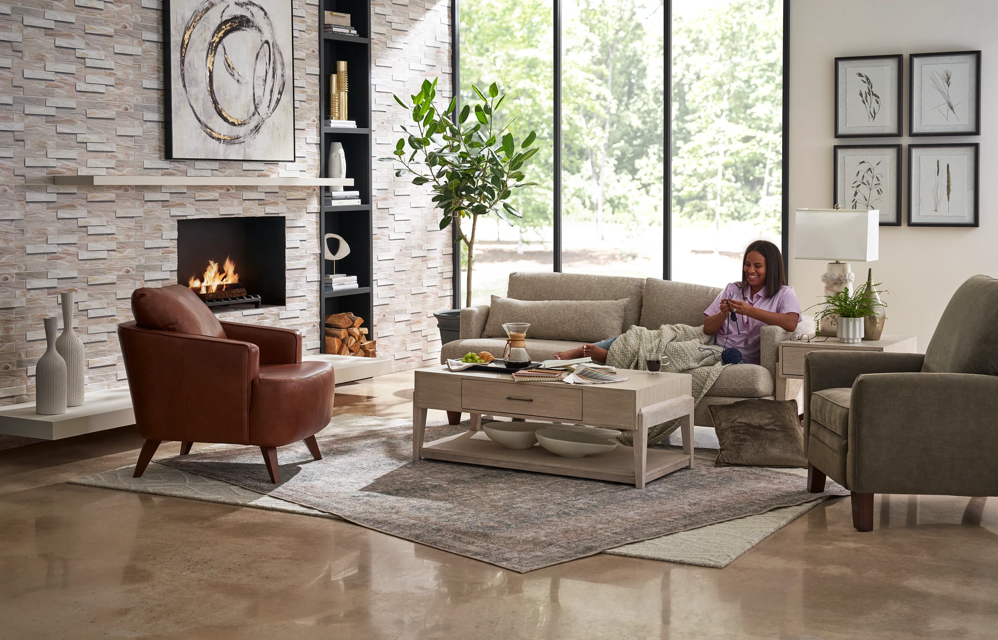 woman sitting on La-Z-Boy sofa smiling